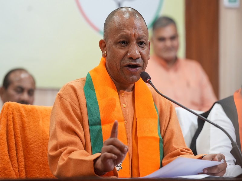 Lucknow: Uttar Pradesh Chief Minister Yogi Adityanath addresses a press conference on the party's victory in the Uttar Pradesh by-elections