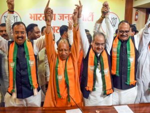 Lucknow: Uttar Pradesh Chief Minister Yogi Adityanath, along with Deputy Chief Ministers Brajesh Pathak and Keshav Prasad Maurya, celebrate the party's victory in Uttar Pradesh by-elections in Lucknow on Saturday, November 23, 2024. (Photo: IANS/Phool Chandra)