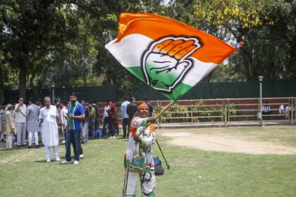 New Delhi : Congress supporters and workers celebrate the party's lead during the counting of votes for the Lok Sabha elections at AICC headquarters