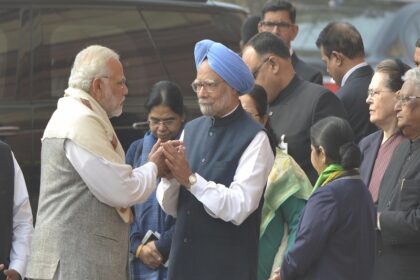 New Delhi: Prime Minister Narendra Modi greets his predecessor Manmohan Singh as they arrive to pay tributes to the martyrs of 2001 Parliament attack in New Delhi on Dec 13, 2017. (File Photo: IANS)