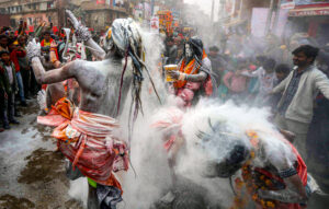 Prayagraj: Sadhus (holy men) of the Panchayati Mahanirvani Akhara, adorned with bhasma (sacred ash), perform during 'Peshwai,' a religious procession ahead of the Maha Kumbh Mela 2025 in Prayagraj on Thursday, January 02, 2025. (Photo: IANS)