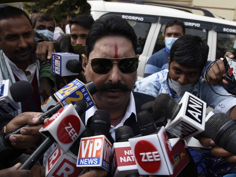 Patna: Jailed RJD MLA Anant Kumar Singh talks to the media outside the Bihar Assembly during the ongoing winter session, in Patna on Nov 25, 2020. (Photo: IANS)