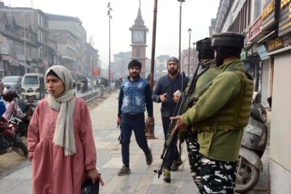 Srinagar: Security personnel stand guard as security is beefed up following the Supreme Court's verdict on the batch of petitions challenging the abrogation of Article 370 in Jammu and Kashmir, at Lal Chowk in Srinagar on Monday, December 11, 2023. (Photo: IANS/Umar Qadir)