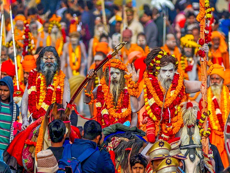 Prayagraj: Naga Sadhus (holy men) of the Shambhu Panchayati Atal Akhara take part in a religious procession ahead of the upcoming Maha Kumbh Mela in Prayagraj on Wednesday, January 1, 2025. (Photo: IANS)