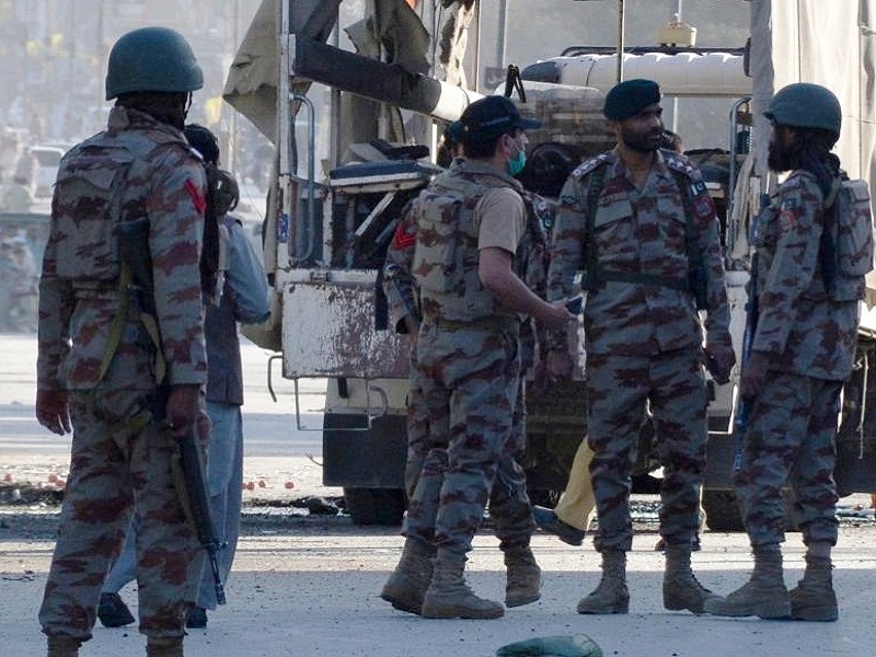 Security personnel examine the blast site in southwest Pakistan's Quetta on Oct. 18, 2021. (Photo by Asad/Xinhua/IANS)