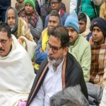 Patna: Jan Suraaj chief Prashant Kishor with others during an indefinite hunger strike demanding the cancellation of the 70th Integrated Combined Competitive (Preliminary) Examination (CCE), 2024, conducted by the BPSC, over allegations of a question paper leak near the Mahatma Gandhi statue in Patna on Saturday, January 04, 2025. (Photo: IANS)